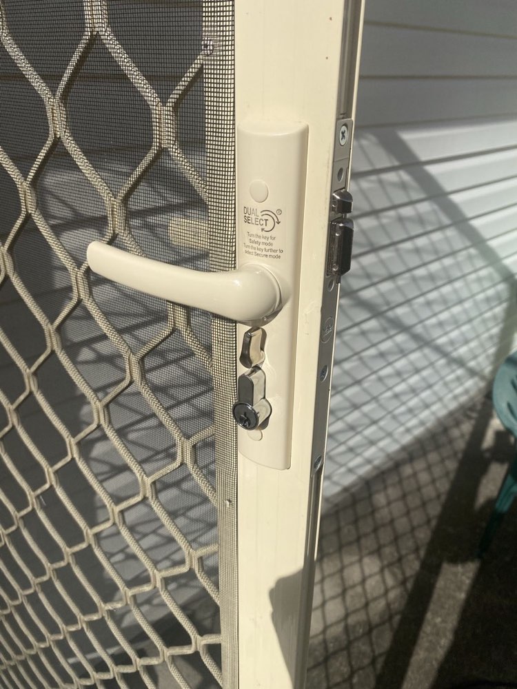 Security door with new handle fitted — after