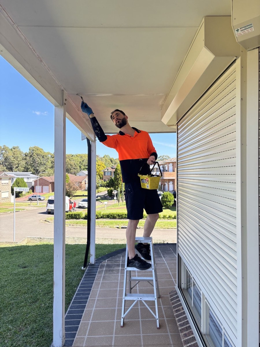 The MARS Australia team painting an exterior ceiling on a recent job
