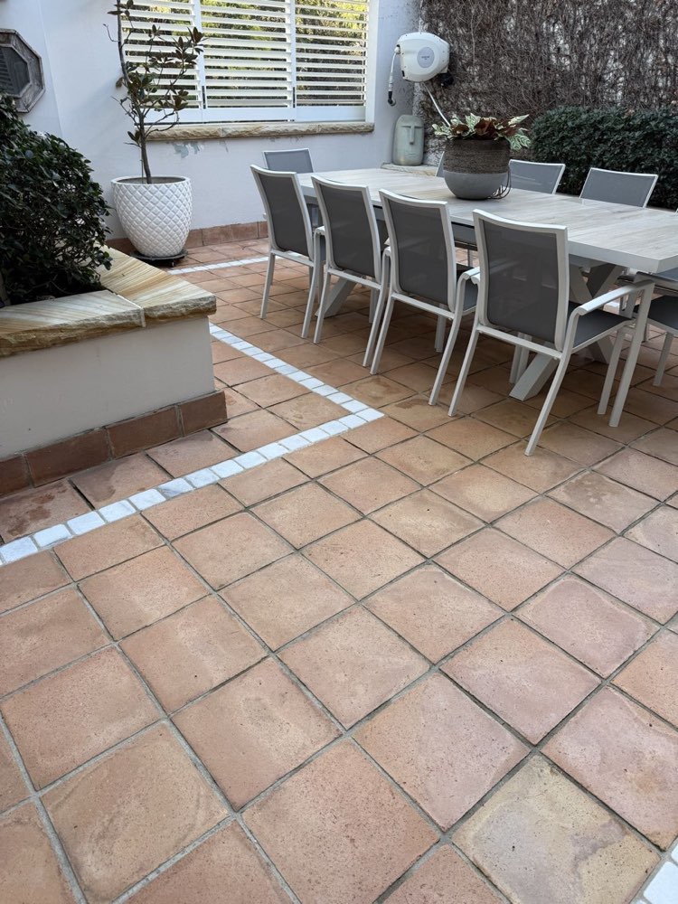 Freshly pressure-cleaned outdoor tiles — after